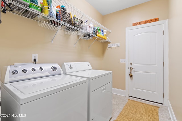 laundry area featuring washing machine and dryer