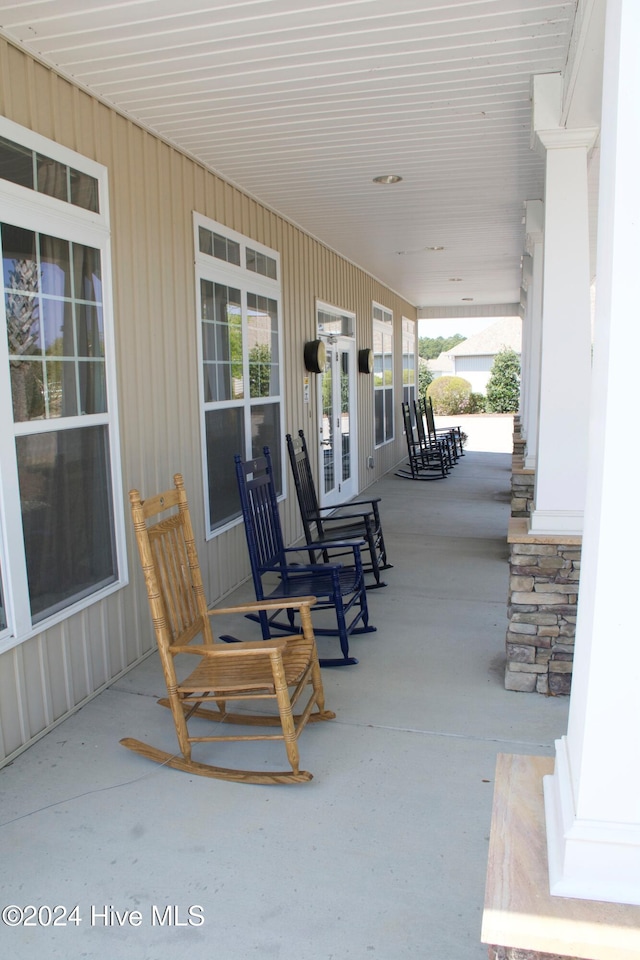 view of patio featuring a porch