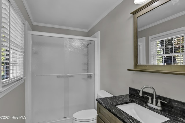 bathroom with walk in shower, toilet, plenty of natural light, and ornamental molding