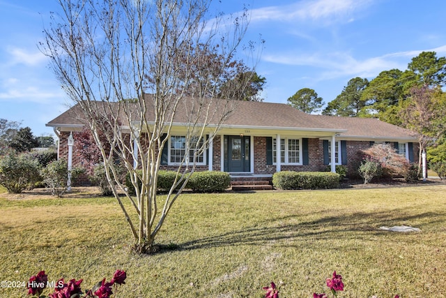 single story home with a front yard