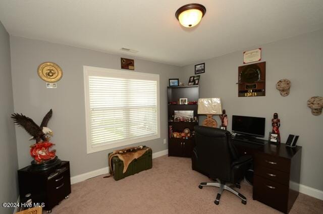 home office featuring light carpet