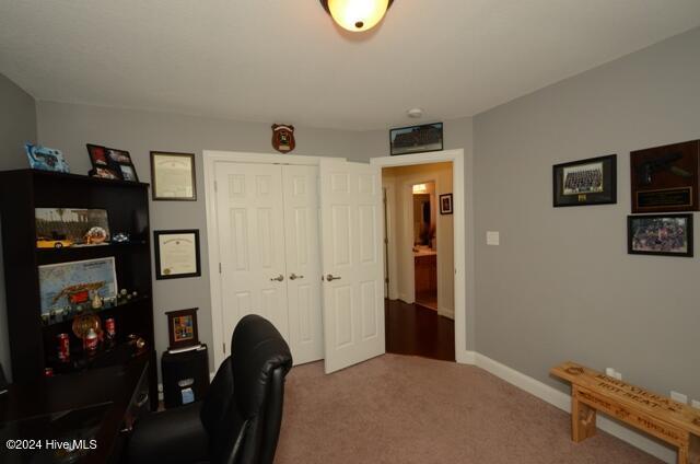 home office with carpet floors