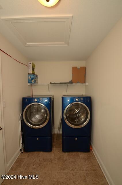 laundry area featuring separate washer and dryer