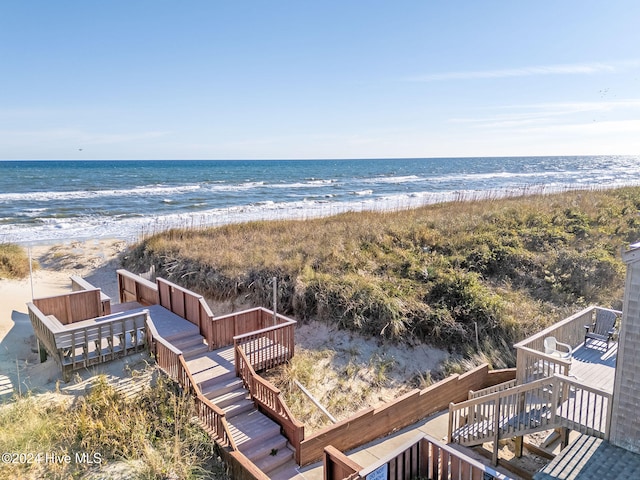 drone / aerial view with a view of the beach and a water view