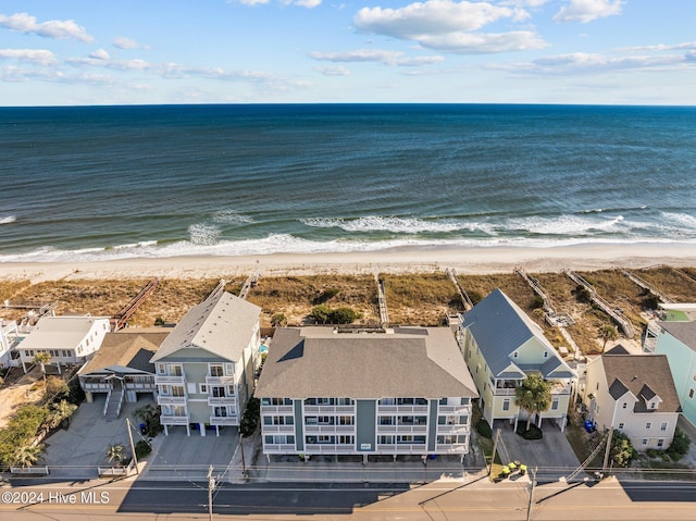 aerial view with a view of the beach and a water view