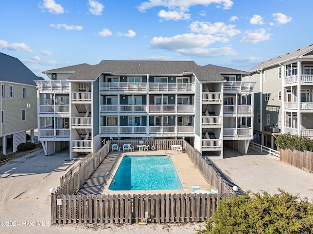 view of swimming pool featuring a patio area