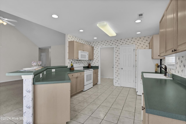 kitchen with kitchen peninsula, ceiling fan, light brown cabinetry, and white appliances