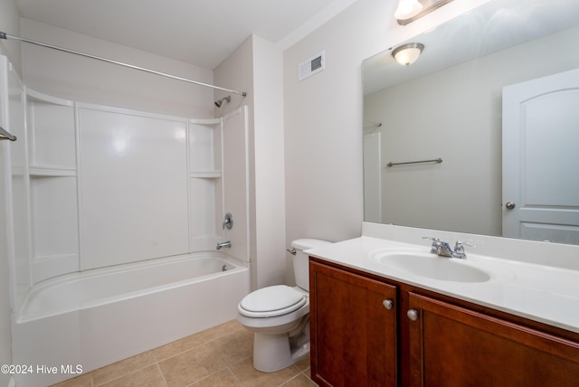 full bathroom featuring tile patterned floors, vanity, toilet, and tub / shower combination