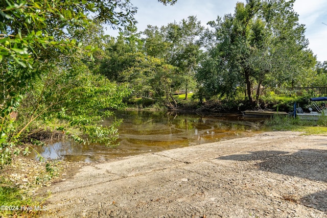 view of street with a water view