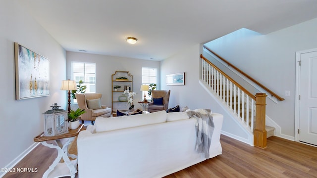 living room with light hardwood / wood-style flooring