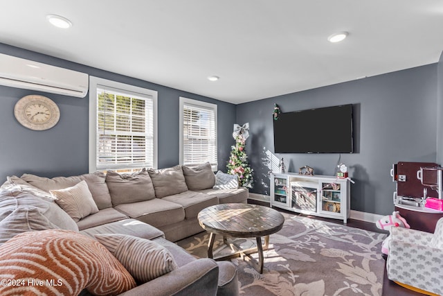 living room with wood-type flooring and a wall mounted AC