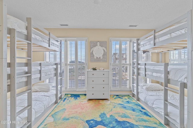 bedroom featuring a textured ceiling