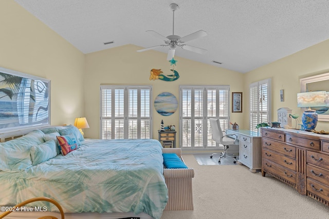 bedroom featuring light carpet, multiple windows, lofted ceiling, and ceiling fan