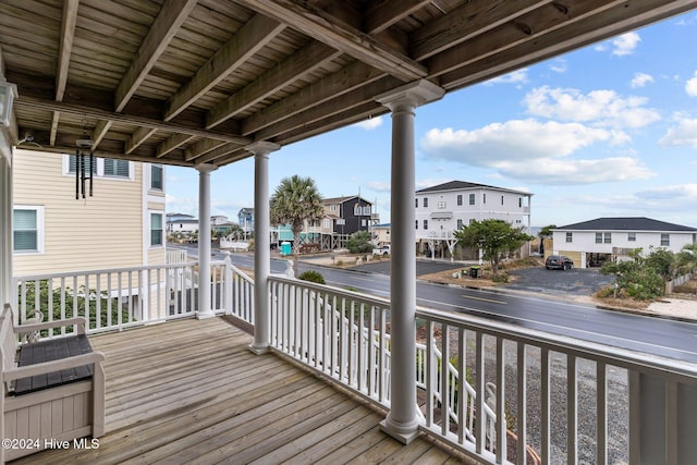 wooden terrace featuring a porch