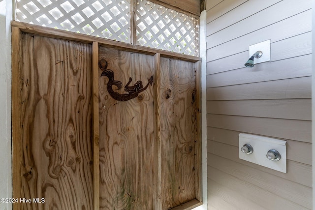 room details featuring wood walls