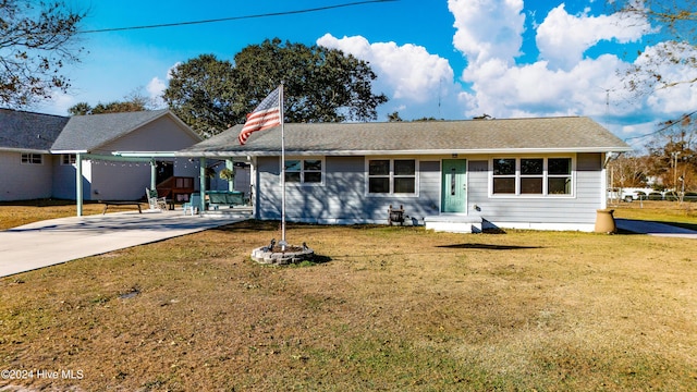 ranch-style house with a front lawn