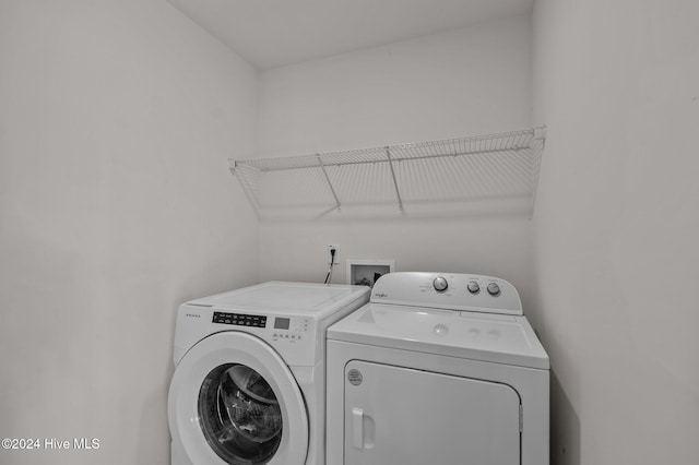 laundry room featuring independent washer and dryer