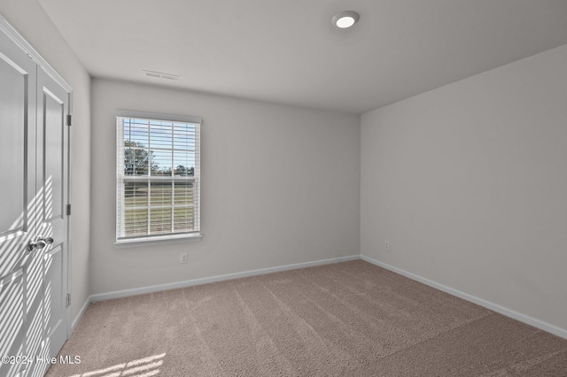 empty room with carpet floors