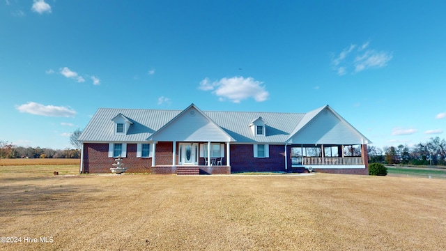 view of front of home with a front yard