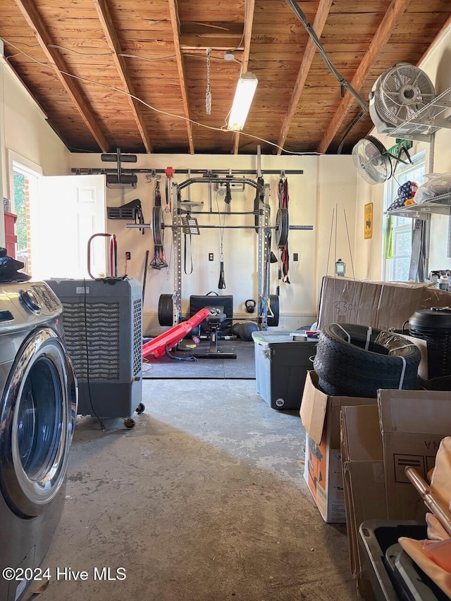 interior space with washer / clothes dryer and wood ceiling