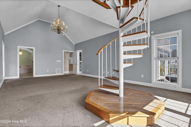 interior space featuring carpet, a chandelier, and high vaulted ceiling