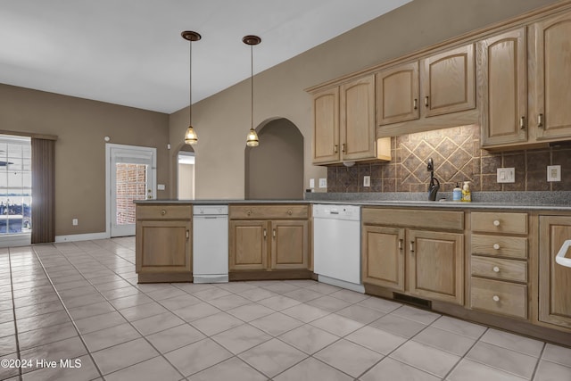 kitchen featuring light brown cabinetry, tasteful backsplash, white dishwasher, pendant lighting, and light tile patterned floors