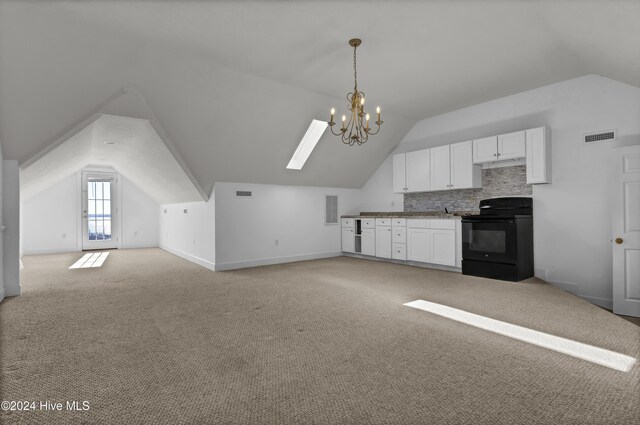 bonus room with a textured ceiling, light colored carpet, and lofted ceiling