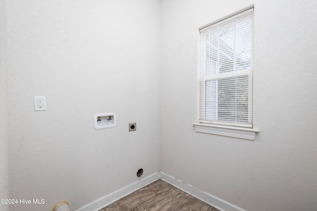 washroom featuring hookup for a washing machine and electric dryer hookup