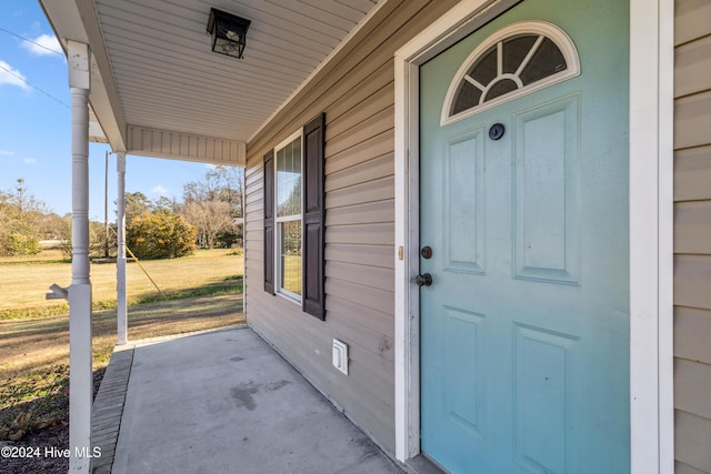 property entrance with a porch