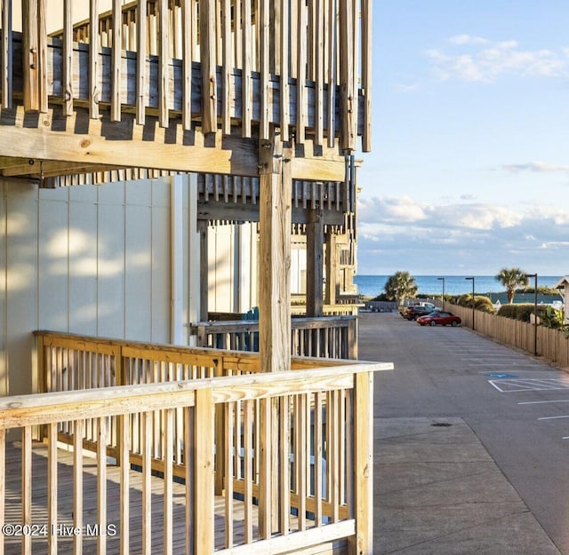 wooden terrace with a water view