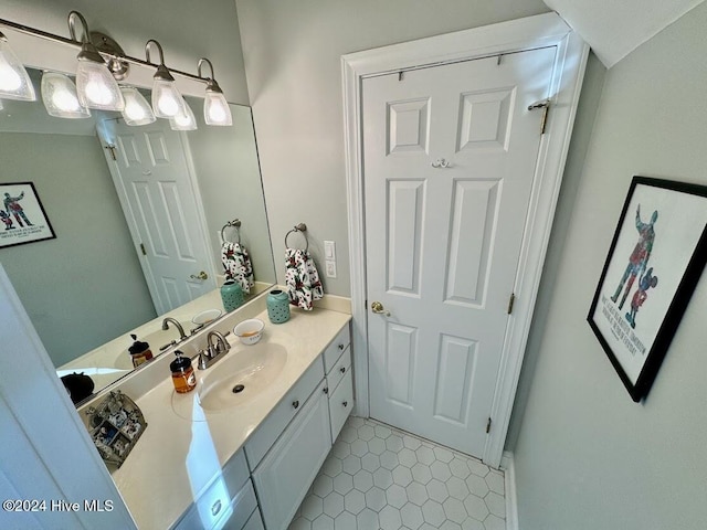 bathroom with vanity and tile patterned floors