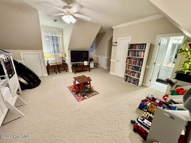 rec room with carpet flooring, ceiling fan, and lofted ceiling