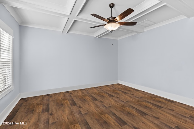 spare room with beamed ceiling, ceiling fan, ornamental molding, and dark wood-type flooring