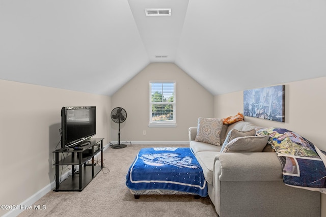 living room with carpet flooring and lofted ceiling