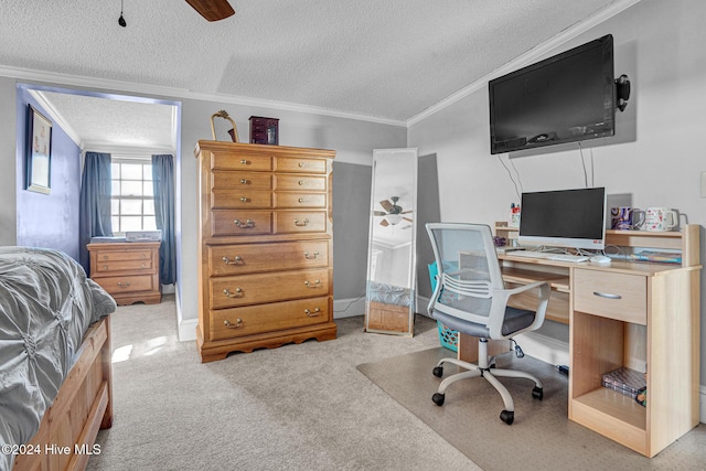 home office featuring crown molding, ceiling fan, light colored carpet, and a textured ceiling