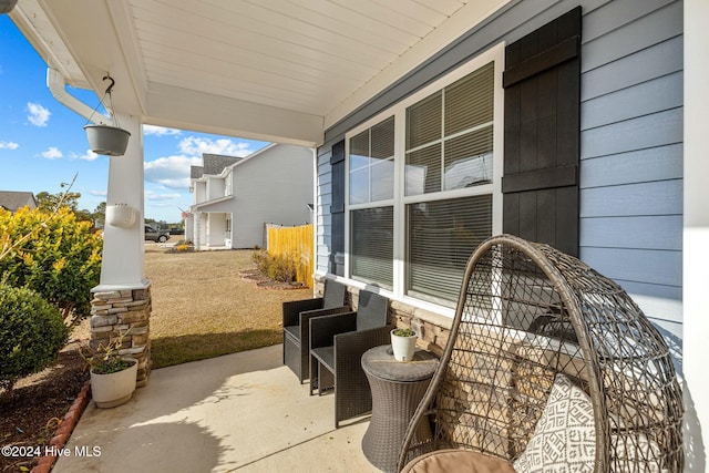 view of patio featuring a porch