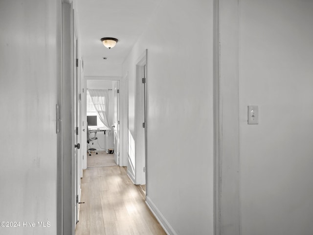 hall featuring light hardwood / wood-style flooring