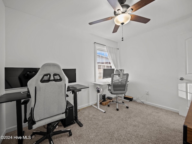 home office with carpet floors and ceiling fan