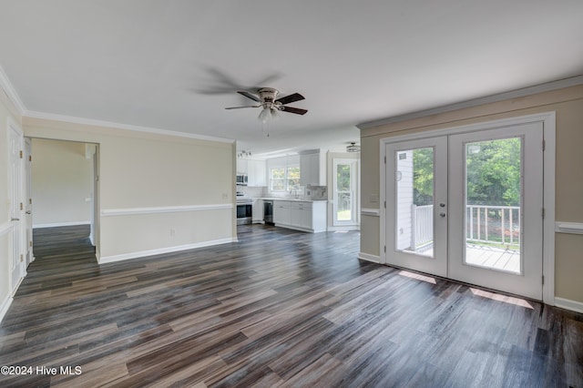 unfurnished living room with ceiling fan, french doors, dark wood-type flooring, and ornamental molding