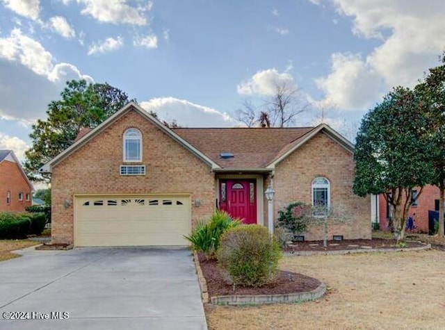 view of front of property with a garage