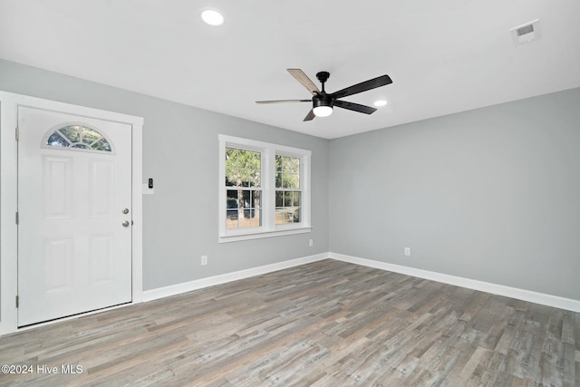 foyer with ceiling fan and hardwood / wood-style floors