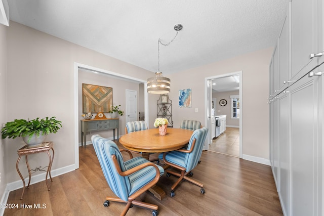 dining area featuring light hardwood / wood-style floors