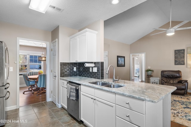 kitchen featuring kitchen peninsula, appliances with stainless steel finishes, ceiling fan, sink, and white cabinets