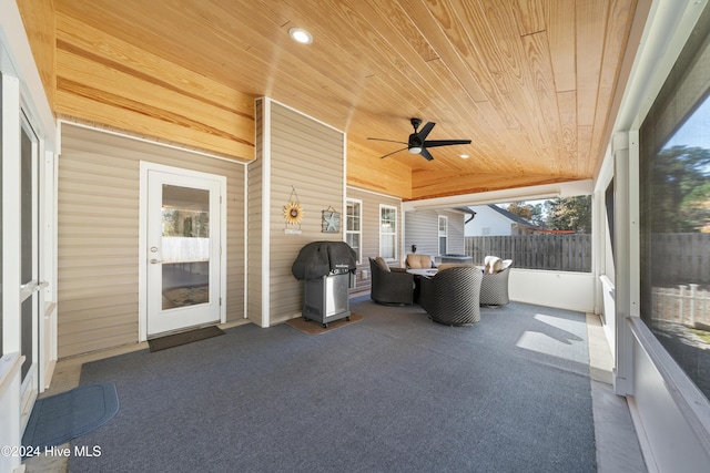 view of patio with ceiling fan and area for grilling