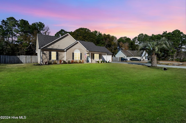 view of front facade with a lawn