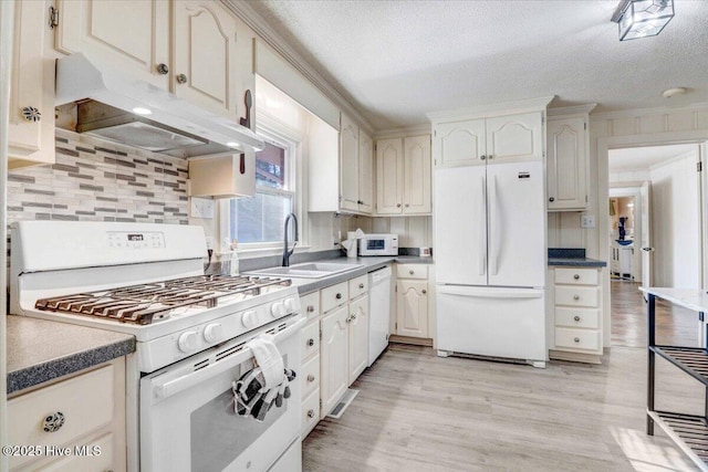 kitchen with crown molding, sink, white appliances, and a textured ceiling