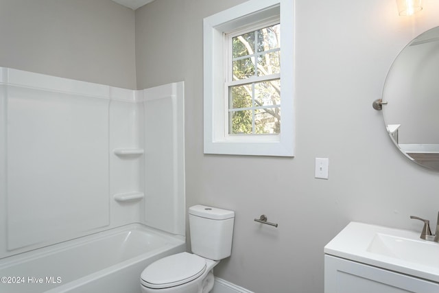 full bathroom featuring shower / washtub combination, vanity, and toilet