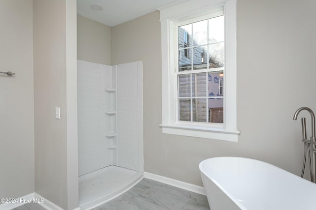 bathroom with independent shower and bath