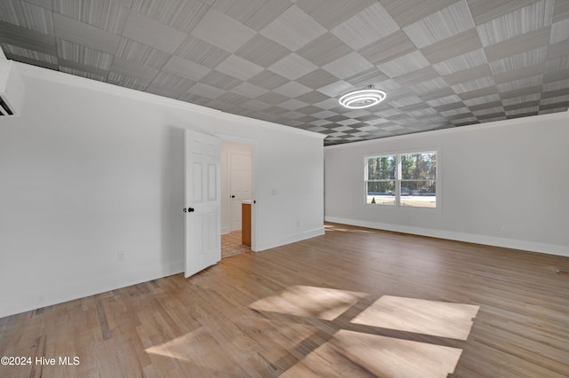 unfurnished room featuring light hardwood / wood-style flooring