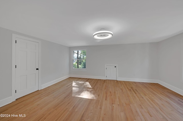 unfurnished room featuring light wood-type flooring